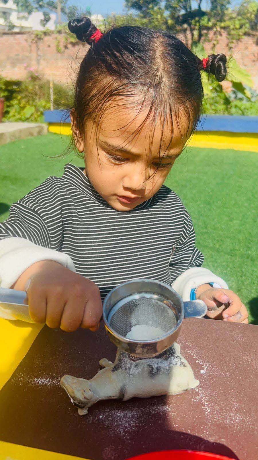 Active children at play EuroKids Mulpani kindergarten Kathmandu Nepal