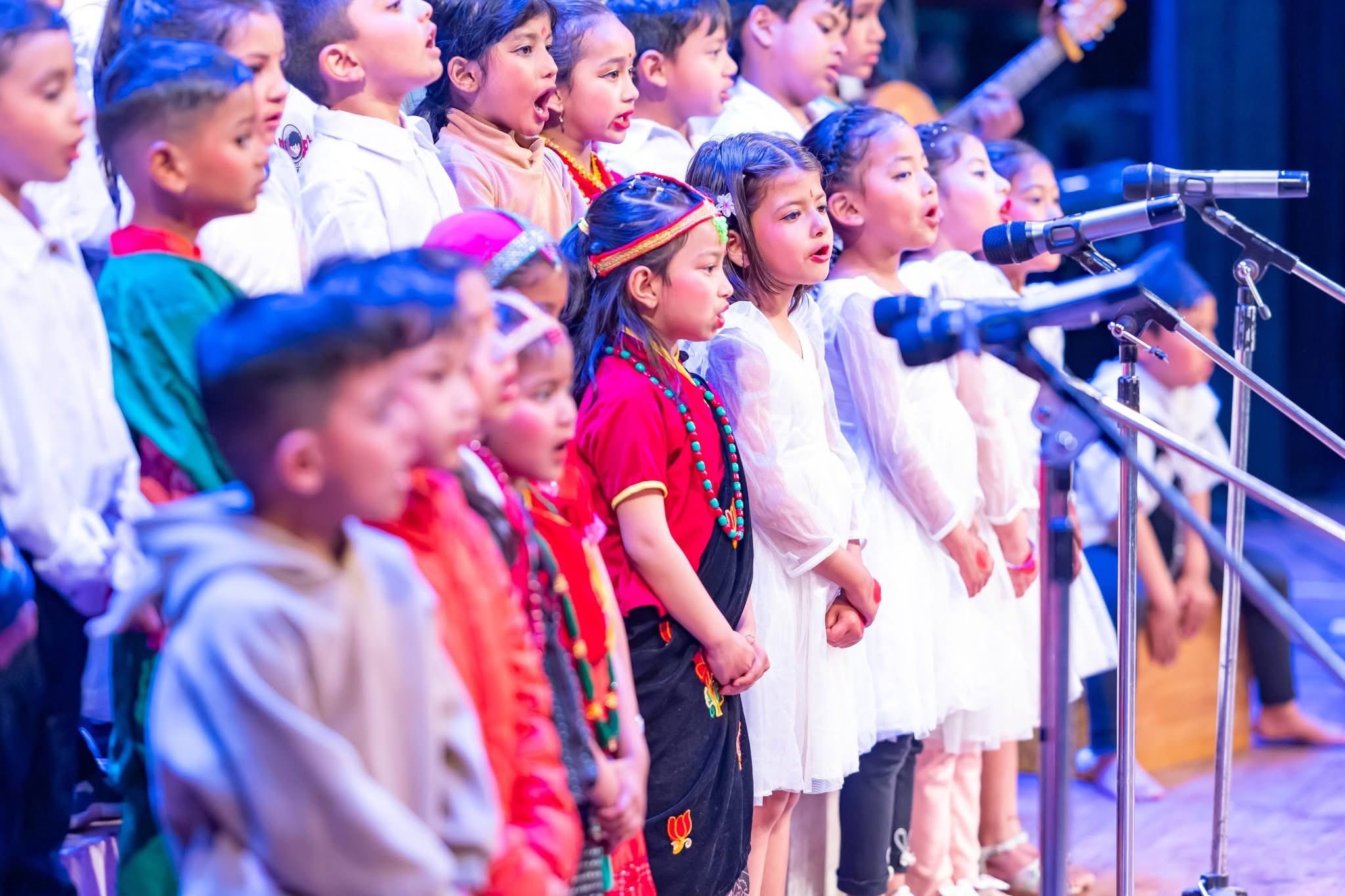 Children singing at EuroKids Mulpani preschool event Nepal